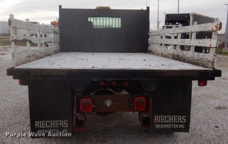 image for item JI9272 2000 Ford F750 Super Duty  flatbed truck