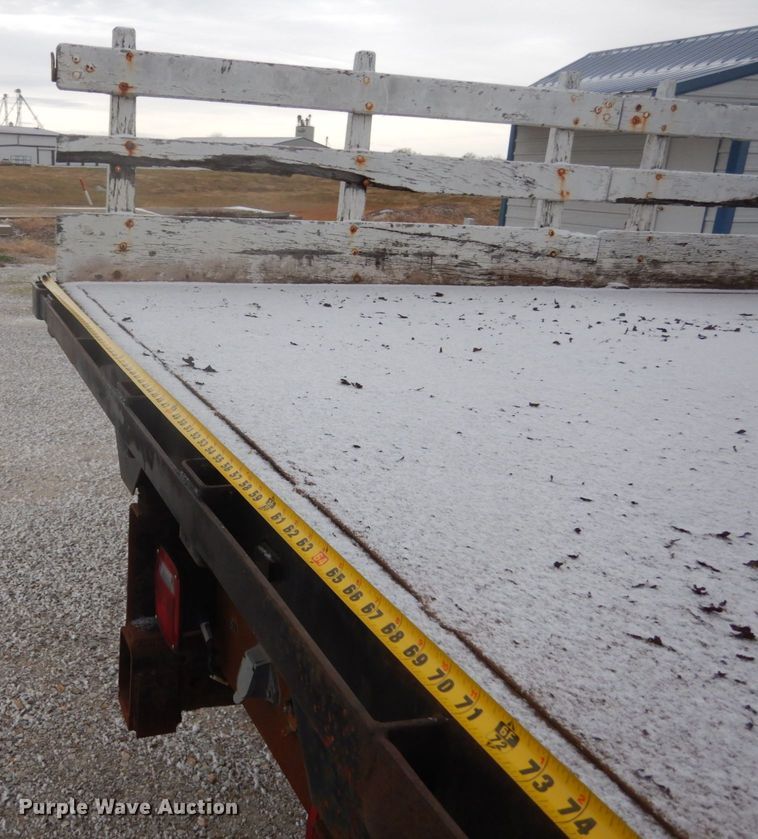 image for item JI9272 2000 Ford F750 Super Duty  flatbed truck