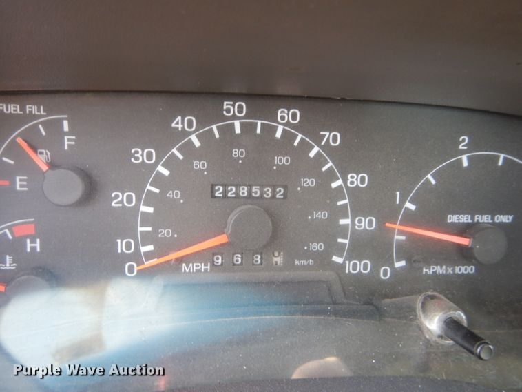 image for item DM4449 1999 Ford F550  flatbed truck