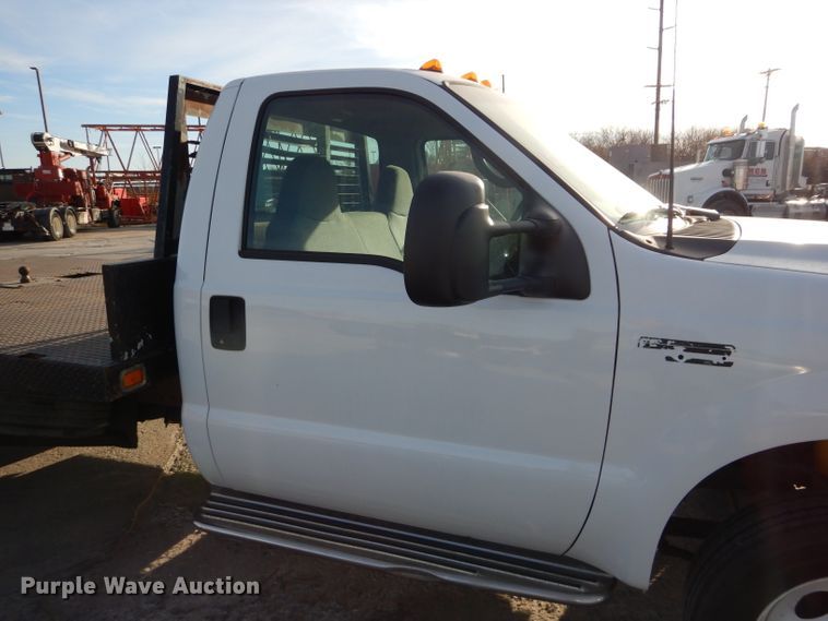 image for item DM4449 1999 Ford F550  flatbed truck