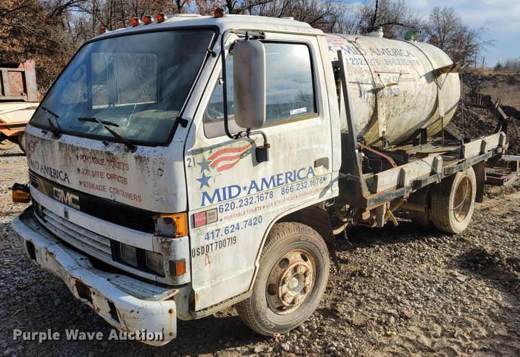 image for item JE9230 1993 GMC 4000DSL  flatbed truck