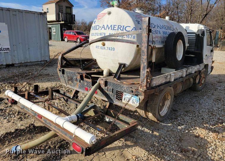 image for item JE9230 1993 GMC 4000DSL  flatbed truck