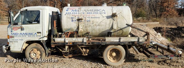 image for item JE9230 1993 GMC 4000DSL  flatbed truck