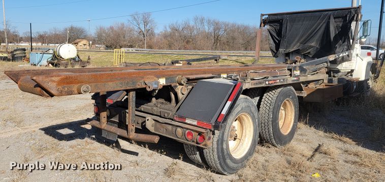 image for item JE9256 1997 Ford LT8000  roll-off container truck