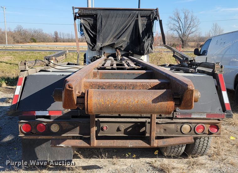 image for item JE9256 1997 Ford LT8000  roll-off container truck