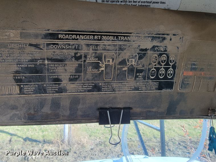 image for item JE9256 1997 Ford LT8000  roll-off container truck