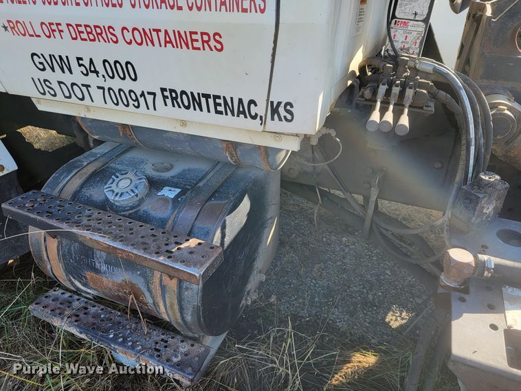 image for item JE9256 1997 Ford LT8000  roll-off container truck