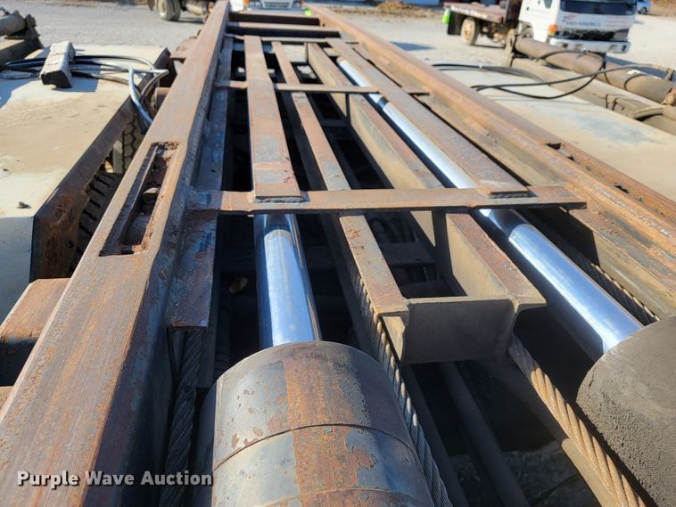 image for item JE9256 1997 Ford LT8000  roll-off container truck