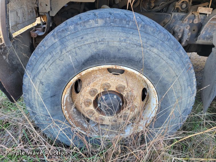 image for item JE9256 1997 Ford LT8000  roll-off container truck