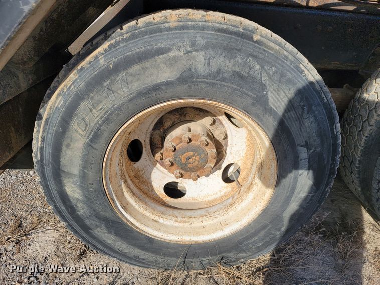 image for item JE9256 1997 Ford LT8000  roll-off container truck