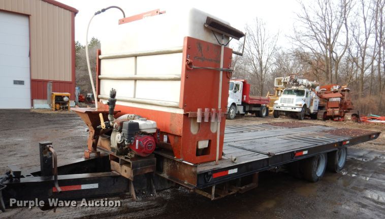 image for item KH9093 1993 Dynaweld  tilt deck equipment trailer with Ditch Witch MM9 mud mixer