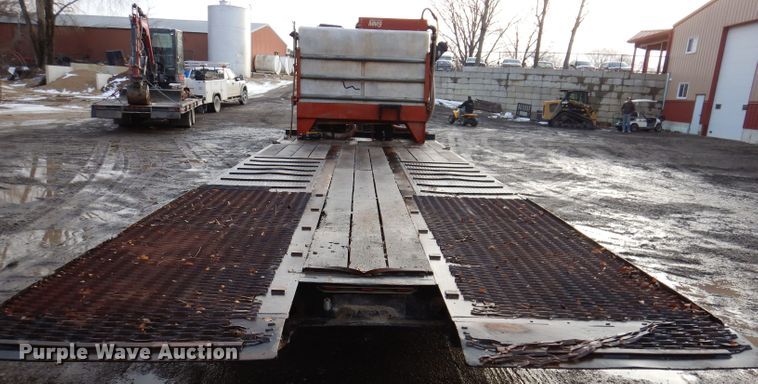 image for item KH9093 1993 Dynaweld  tilt deck equipment trailer with Ditch Witch MM9 mud mixer