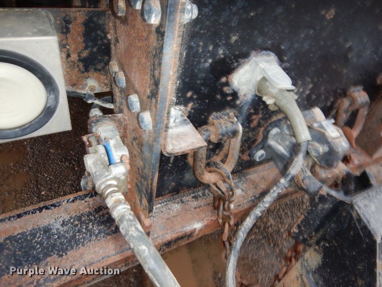 image for item KH9093 1993 Dynaweld  tilt deck equipment trailer with Ditch Witch MM9 mud mixer