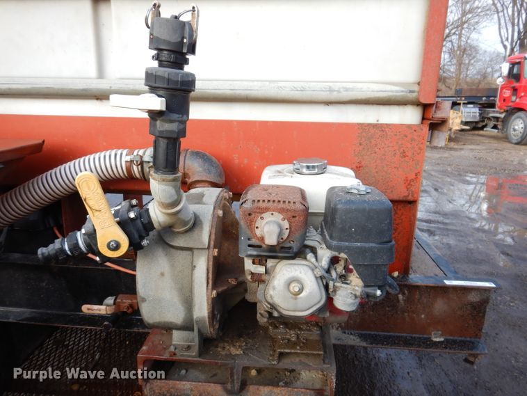 image for item KH9093 1993 Dynaweld  tilt deck equipment trailer with Ditch Witch MM9 mud mixer