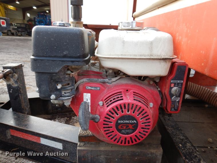 image for item KH9093 1993 Dynaweld  tilt deck equipment trailer with Ditch Witch MM9 mud mixer