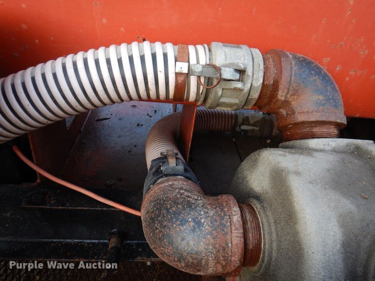 image for item KH9093 1993 Dynaweld  tilt deck equipment trailer with Ditch Witch MM9 mud mixer