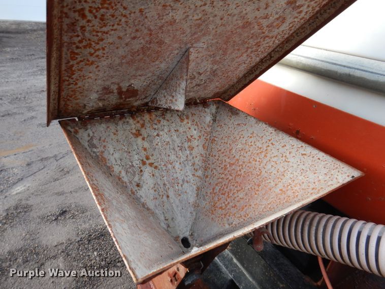 image for item KH9093 1993 Dynaweld  tilt deck equipment trailer with Ditch Witch MM9 mud mixer