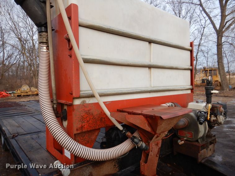 image for item KH9093 1993 Dynaweld  tilt deck equipment trailer with Ditch Witch MM9 mud mixer