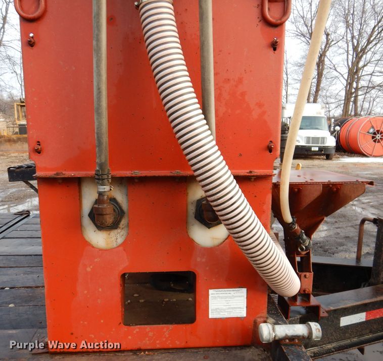 image for item KH9093 1993 Dynaweld  tilt deck equipment trailer with Ditch Witch MM9 mud mixer