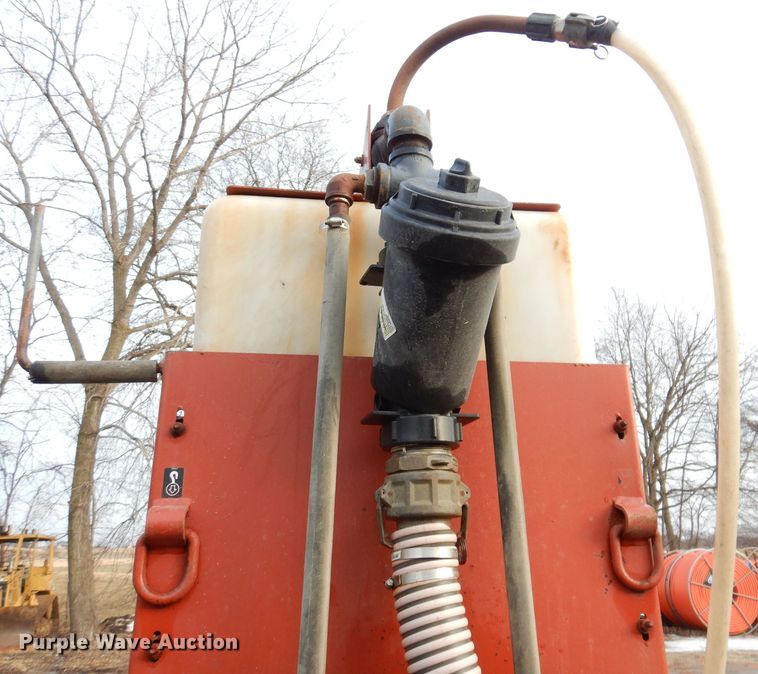 image for item KH9093 1993 Dynaweld  tilt deck equipment trailer with Ditch Witch MM9 mud mixer