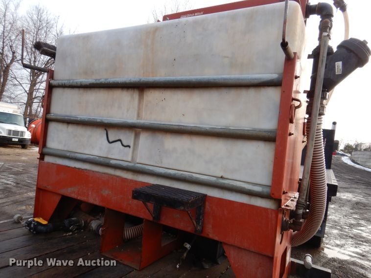 image for item KH9093 1993 Dynaweld  tilt deck equipment trailer with Ditch Witch MM9 mud mixer