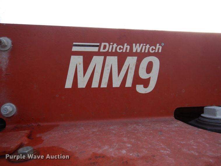 image for item KH9093 1993 Dynaweld  tilt deck equipment trailer with Ditch Witch MM9 mud mixer