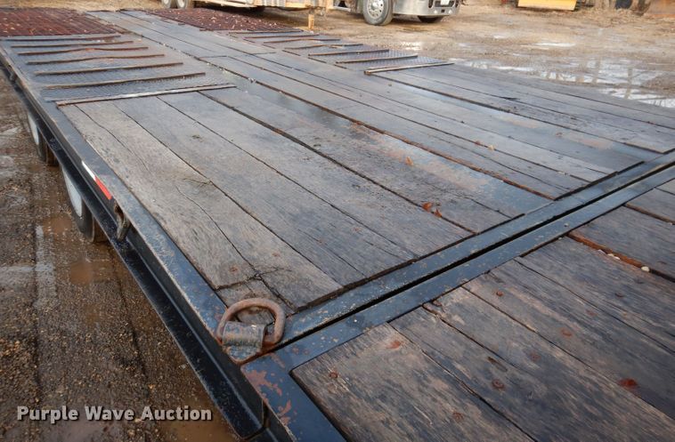 image for item KH9093 1993 Dynaweld  tilt deck equipment trailer with Ditch Witch MM9 mud mixer