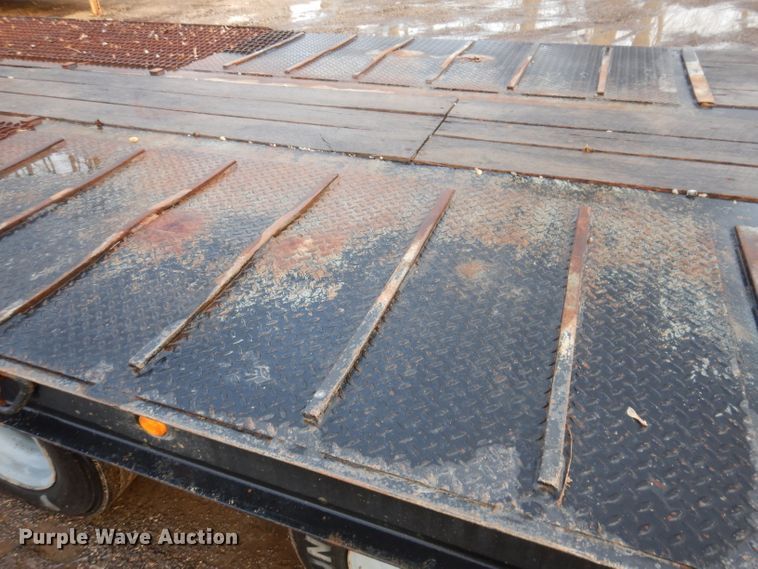 image for item KH9093 1993 Dynaweld  tilt deck equipment trailer with Ditch Witch MM9 mud mixer