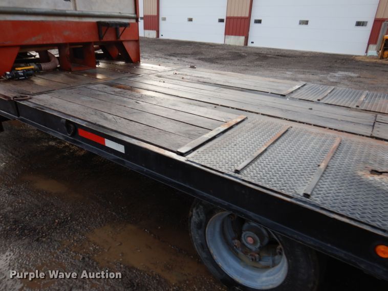 image for item KH9093 1993 Dynaweld  tilt deck equipment trailer with Ditch Witch MM9 mud mixer