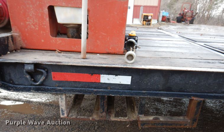 image for item KH9093 1993 Dynaweld  tilt deck equipment trailer with Ditch Witch MM9 mud mixer
