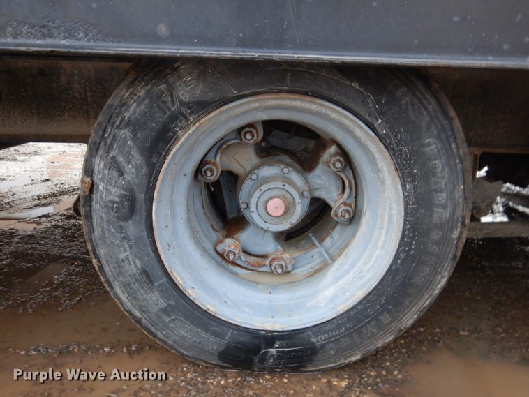 image for item KH9093 1993 Dynaweld  tilt deck equipment trailer with Ditch Witch MM9 mud mixer