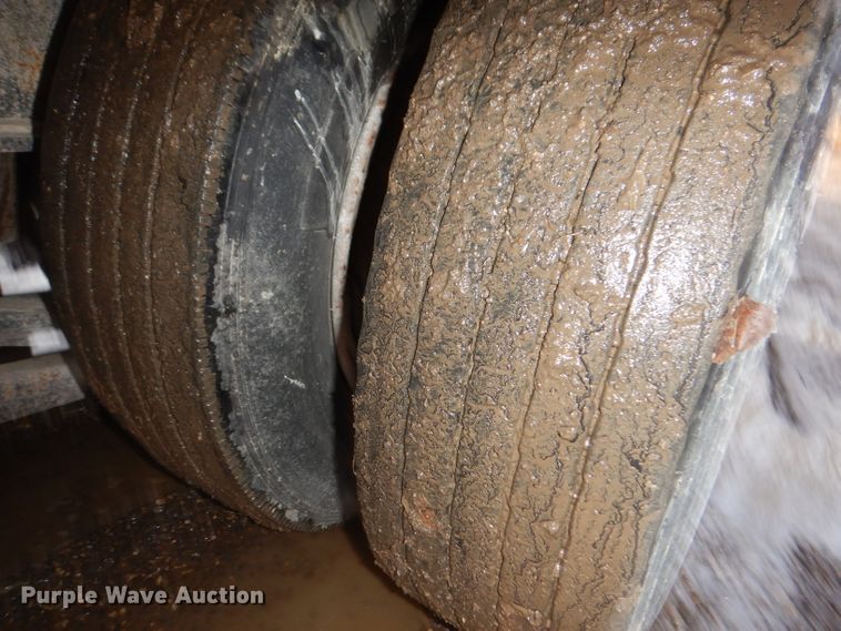 image for item KH9093 1993 Dynaweld  tilt deck equipment trailer with Ditch Witch MM9 mud mixer