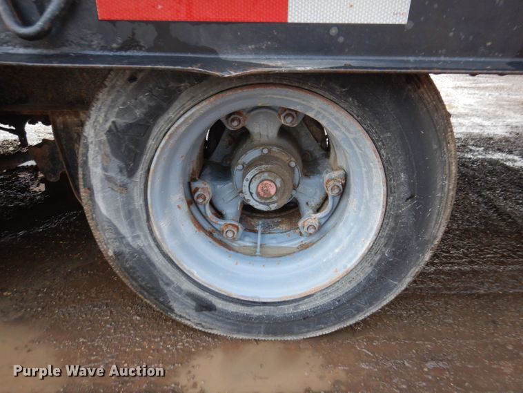 image for item KH9093 1993 Dynaweld  tilt deck equipment trailer with Ditch Witch MM9 mud mixer