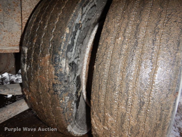 image for item KH9093 1993 Dynaweld  tilt deck equipment trailer with Ditch Witch MM9 mud mixer