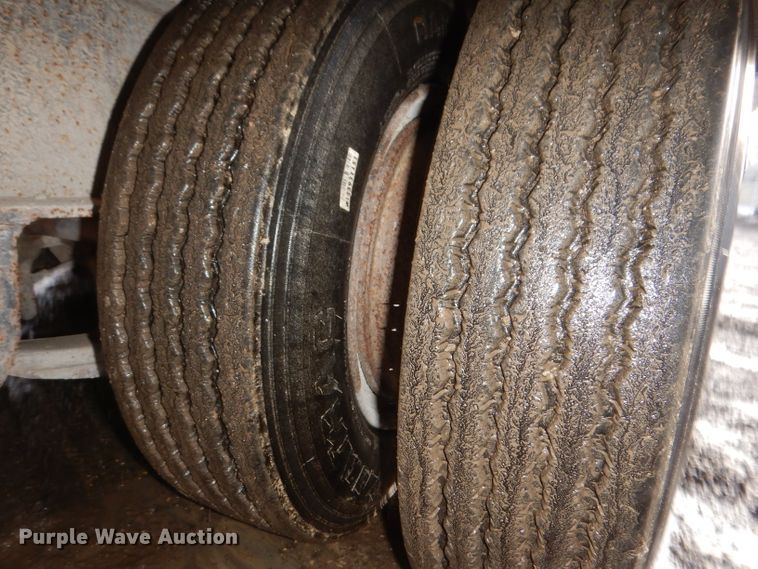 image for item KH9093 1993 Dynaweld  tilt deck equipment trailer with Ditch Witch MM9 mud mixer