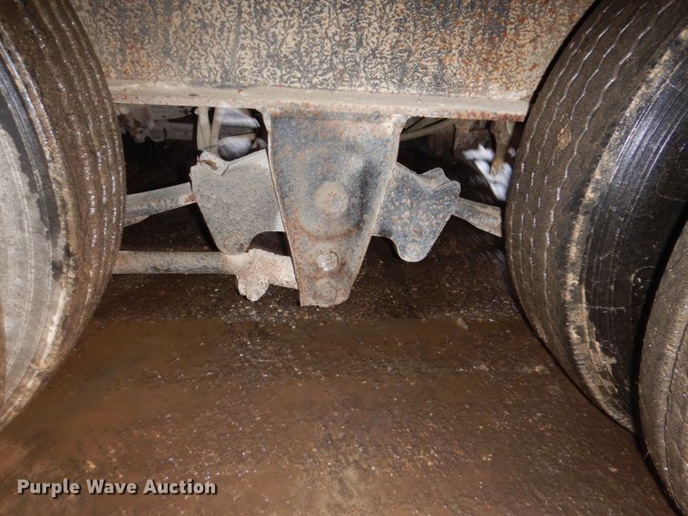 image for item KH9093 1993 Dynaweld  tilt deck equipment trailer with Ditch Witch MM9 mud mixer