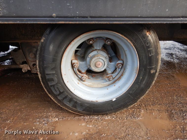 image for item KH9093 1993 Dynaweld  tilt deck equipment trailer with Ditch Witch MM9 mud mixer