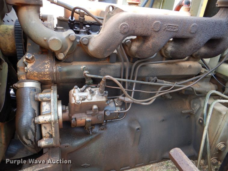 image for item KQ9611 1976 John Deere 410  backhoe