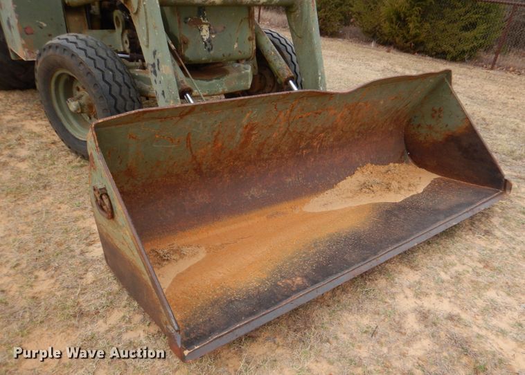 image for item KQ9611 1976 John Deere 410  backhoe