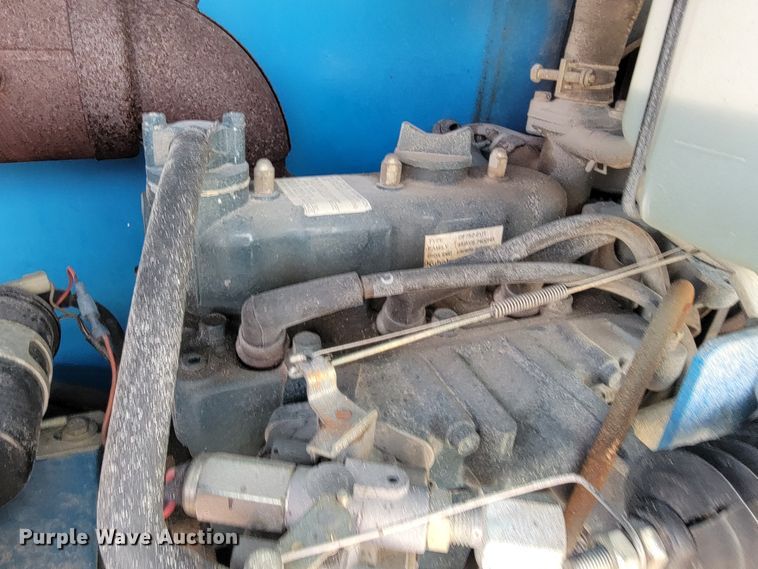 image for item KN9578 2006 Genie 2668 RT  scissor lift