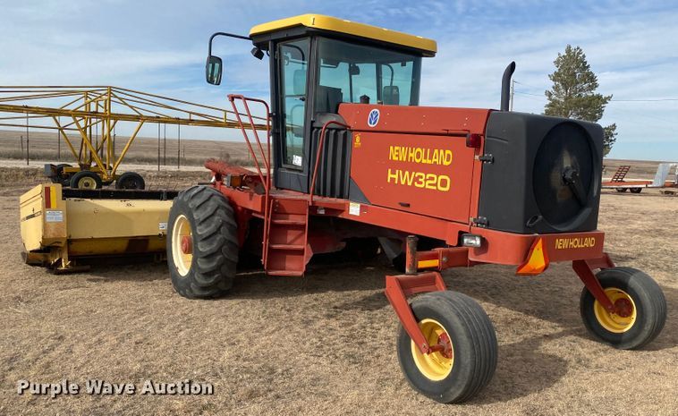 image for item DL1286 2001 New Holland HW320  windrower