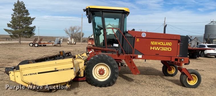 image for item DL1286 2001 New Holland HW320  windrower