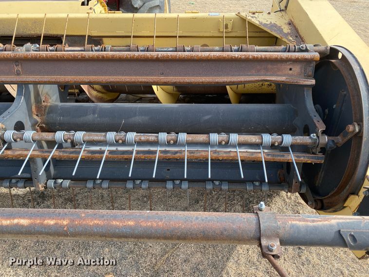 image for item DL1286 2001 New Holland HW320  windrower