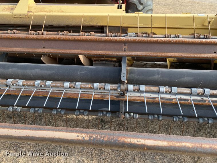 image for item DL1286 2001 New Holland HW320  windrower