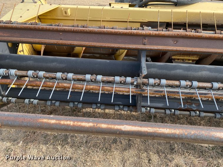 image for item DL1286 2001 New Holland HW320  windrower