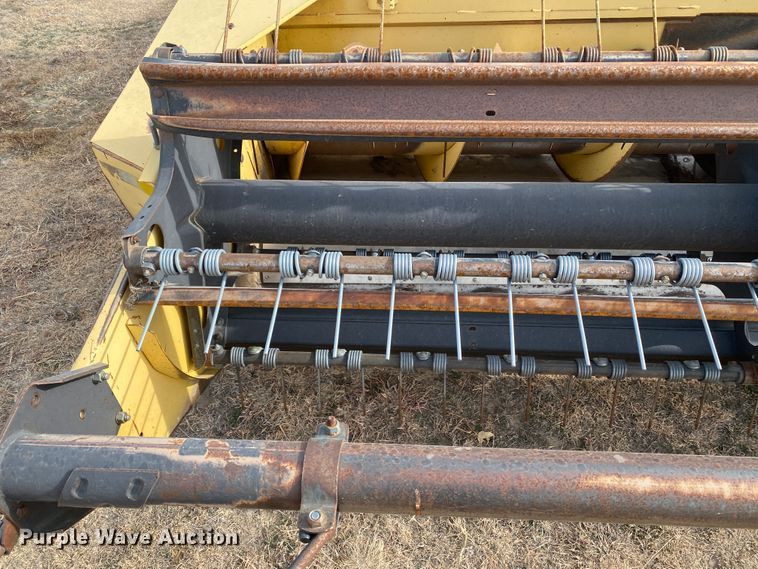 image for item DL1286 2001 New Holland HW320  windrower