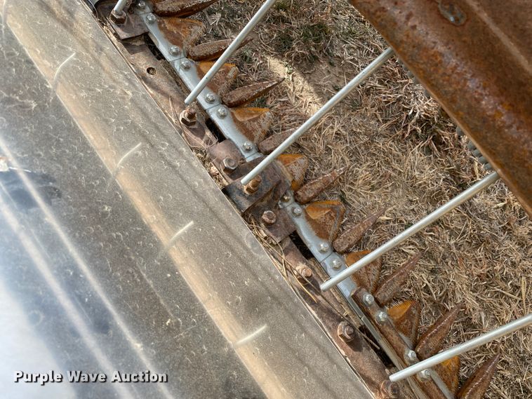 image for item DL1286 2001 New Holland HW320  windrower