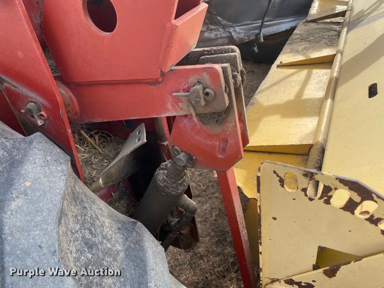 image for item DL1286 2001 New Holland HW320  windrower