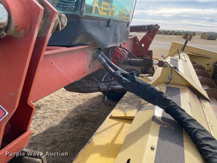 image for item DL1286 2001 New Holland HW320  windrower