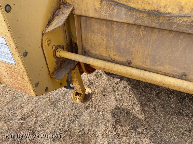 image for item DL1286 2001 New Holland HW320  windrower